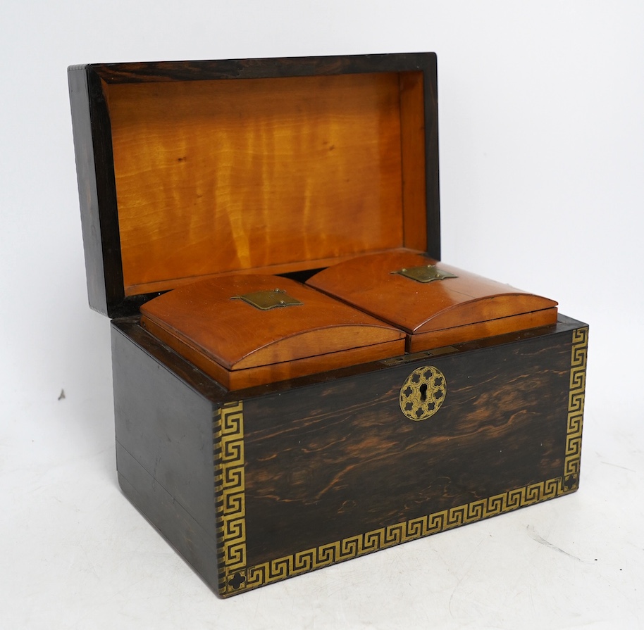 An early 19th century brass inlaid coromandel tea caddy with birch lining, 25cm wide. Condition - fair